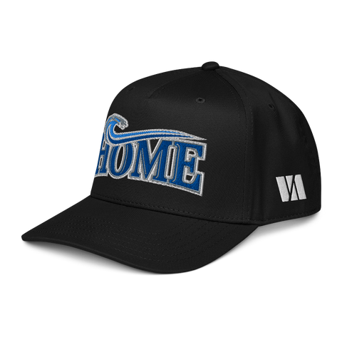 A black baseball cap featuring a blue and silver embroidered 'HOME' design with a wave motif on the front, and a small white VA detail on the side
