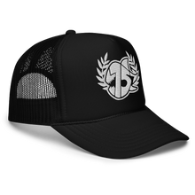 A black trucker hat with a white embroidered logo on the front, set against a plain white background.