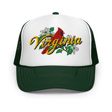 A white and green trucker hat featuring a graphic on the front panel with a red cardinal, white dogwood flowers, green leaves, and the word 'Virginia' in yellow script.