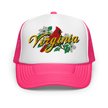 A white and hot pink trucker hat featuring a graphic on the front panel with a red cardinal, white dogwood flowers, green leaves, and the word 'Virginia' in yellow script.