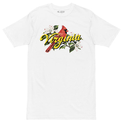 A white short-sleeve crewneck t-shirt featuring a graphic print of a red cardinal, green leaves, white flowers, and the word 'Virginia' in yellow script across the chest.
