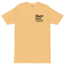 A light yellow short-sleeve t-shirt with a black graphic on the left chest reading 'Virginia Ski and Boat Club'