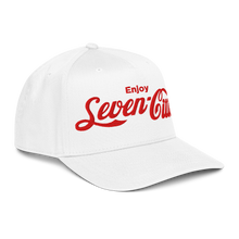 A white baseball cap with red embroidered text reading 'Enjoy Seven Cities' on the front, shown against a plain white background.